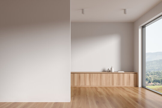 Fototapeta Cozy home living room interior with drawer, decoration and window. Mockup wall