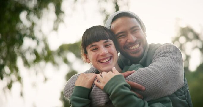 Face, hug and couple outdoor, love and happiness with support, bonding or romantic gesture. Portrait, man or woman in a park, relationship or marriage with romance, embrace or funny with quality time
