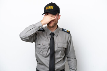 Young safeguard caucasian man isolated on white background covering eyes by hands. Do not want to...