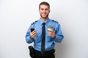 Young police caucasian man isolated on white background holding coffee to take away and a mobile