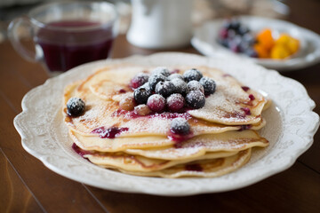 Swedish pancake with blueberry on top generative AI - obrazy, fototapety, plakaty