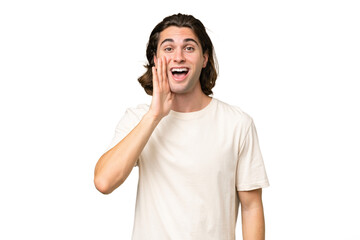 Young caucasian man isolated on green chroma background with surprise and shocked facial expression