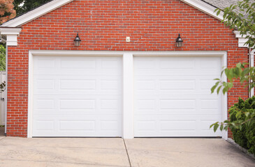 garage door stands as a gateway of privacy and utility, symbolizing security, shelter, and the hidden narratives within a home