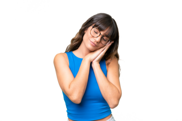 Young caucasian woman over isolated background making sleep gesture in dorable expression