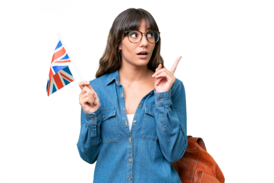 Young caucasian woman holding an United Kingdom flag over isolated background thinking an idea pointing the finger up