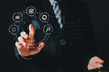 A person touch world and using a smartphone to plan in e-business, the use of online digital network technology in business, buying and selling commerce online digital marketplace