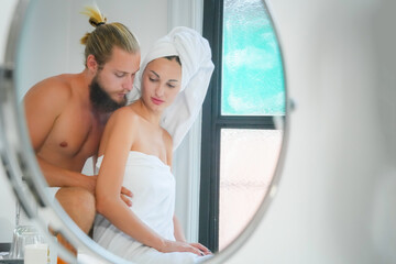 Romantic young couple enjoying and relaxing in the bathtub