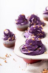 Sweet and tasty cupcakes with golden sprinkles.
