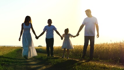 mother father child daughter son walk sunset, holding hands parents girl boy, happy family, wheat field, childhood dream, big happy family, parents children walking lawn, running cheerful child parent