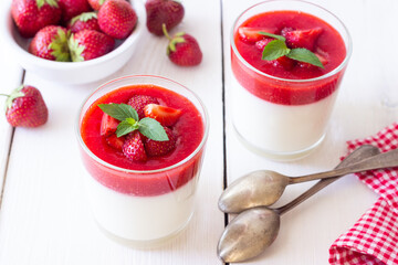 Panna Cotta with strawberries and mint. Dessert. Vegetarian food.