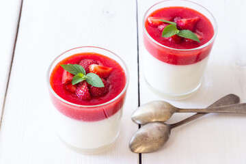 Panna Cotta with strawberries and mint. Dessert. Vegetarian food.