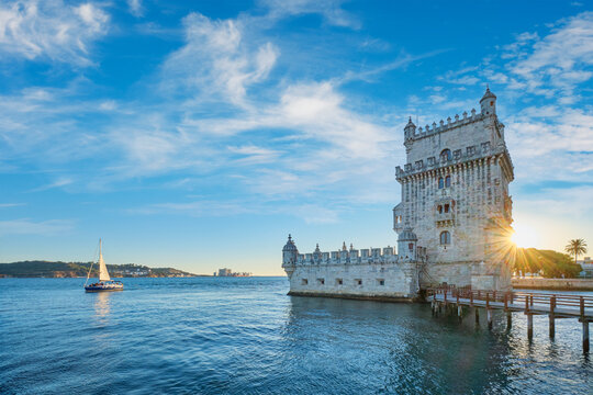 Belem Tower or Tower of St Vincent - famous tourist landmark of Lisboa and tourism attraction - on the bank of the Tagus River Tejo on sunset. Lisbon, Portugal