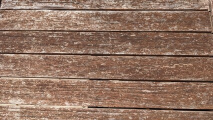 Fototapeta premium Texture of wood background. Nature brown walnut wood texture background board seamless wall and old panel wood grain wallpaper.