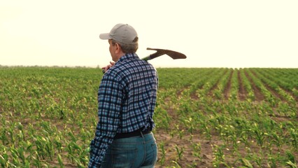 farmer shovel corn field, work field with shovel, smile face portrait farmer, farming shovel, male...
