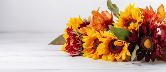 Dahlia and sunflowers bouquet on white background with copy space