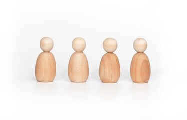 Photo of four wooden miniature people