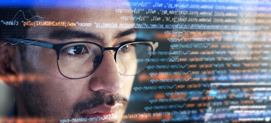 Computer, coding hologram and man in data analytics, information technology overlay or html at night. Programmer or IT person in glasses reading software script, programming or cybersecurity research