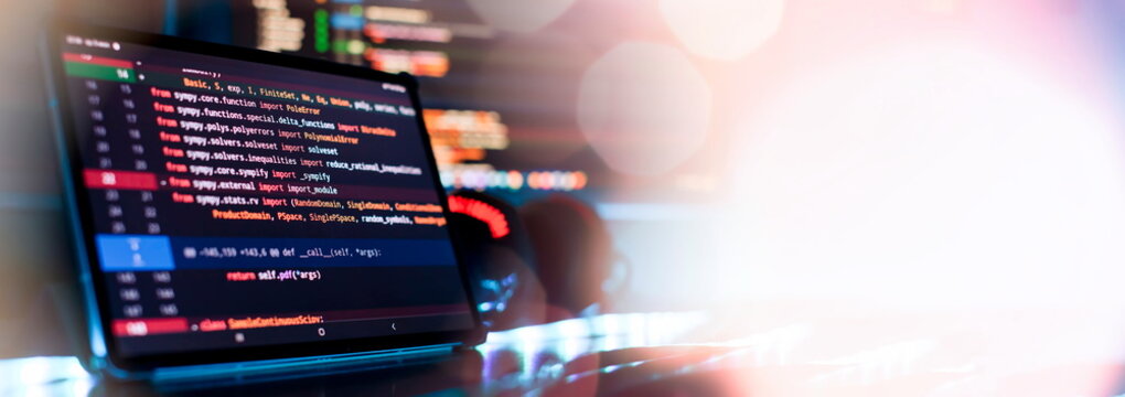 Notebook closeup photo. CSS, JavaScript and HTML usage. Monitor closeup of function source code. Abstract IT technology background. Software source code.