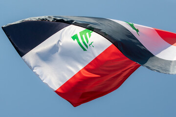 National flag of Iraq for advertising, celebration, achievements, festivals, elections. Iraq national flag flutters in the beautiful sky. great news.