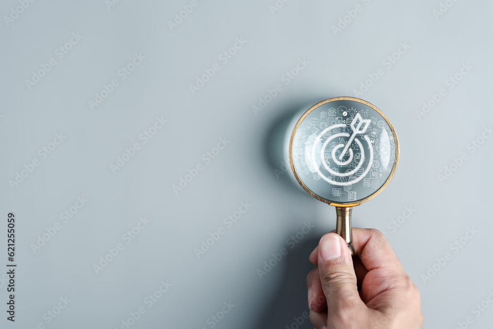 Aufkleber magnifier glass focus to target objective with business icons. planning development leadership and c