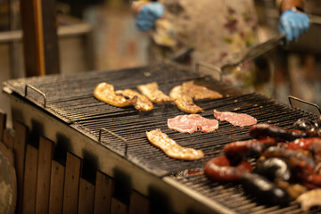 Sausages and other meat products are fried at the festival