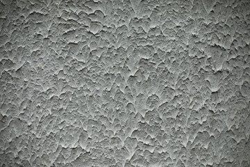 Rough texture of wall. Testurated paint on wall. Grey background.