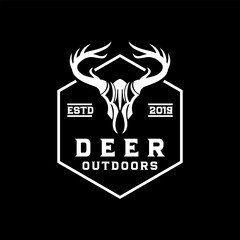 Deer skull vintage logo outdoor adventure design template vector illustration