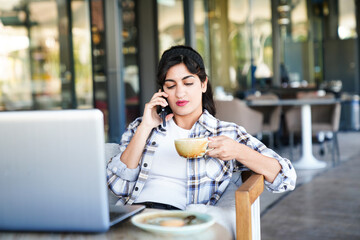 modern woman talking on cell phone