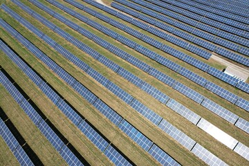 Modern solar power plant, photovoltaic panels green energy electricity production,new power plant, European energy crisis 2022, green deal,Czech republic,European Union,aerial panorama landscape view	