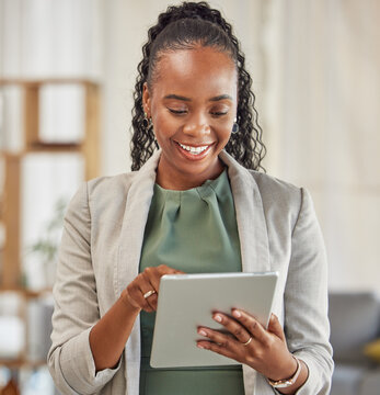 Lawyer, happy or black woman with tablet in office for legal research, online app and social media. News, technology or professional African attorney reading business email, networking or internet