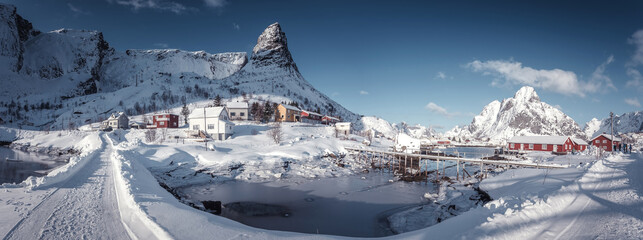 Amazing sunny morning on Lofoten. Scenic photo of winter mountains and blue sky. Stunning natural background. Picturesque Scenery of Reinefjord one most popular place of Lofoten islands. Norway © jenyateua
