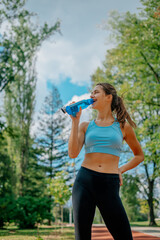 Smiley girl is about to drink some water