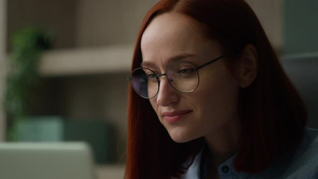 Caucasian business woman read news in laptop working with computer work in internet female professional girl businesswoman user lady using pc technology pensive looking at screen online job in office