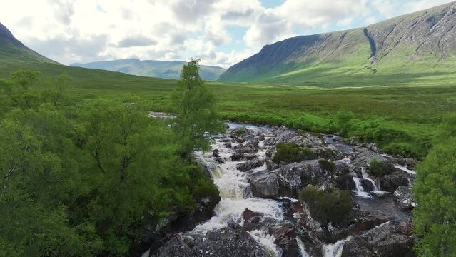 Buachaille Etive M&ograve;r and Waterfall from a drone, River Coupall, Glen Etive and River Etive, Highlands, Scotland, UK