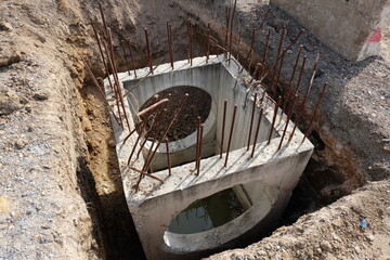Construction works laying sewers on the road