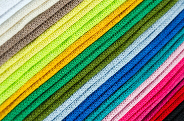 Obraz premium A bright palette of multi-colored, cotton threads for macrame.