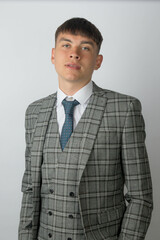 Young entrepreneur in a suit, tie and waistcoat