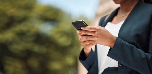 Woman, hands and phone in city for communication, social media or networking outdoors. Closeup of...