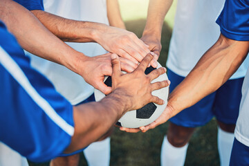 Football, hands together and teamwork, support and sports for training at stadium. Collaboration,...
