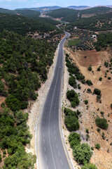 Ajloun, Jordan : An aerial view of the forests, trees, mountains of Ajloun, its streets and roads taken from the Ajloun cable car