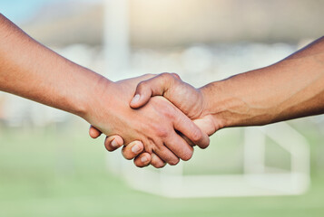 Football, team handshake and partnership at stadium for sports deal, support or agreement....