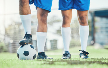 Legs, soccer and ball with a team ready for kickoff on a sports field during a competitive game...