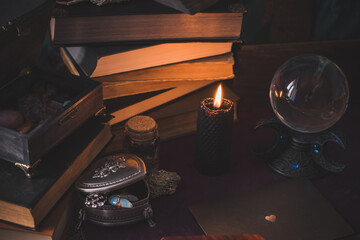 Magical scene, esoteric and wicca concept, fortune telling, witch stuff on a table	