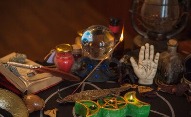 Magical scene, esoteric and wicca concept, fortune telling, witch stuff on a table	