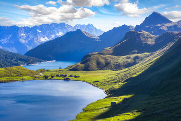 View of lake Ritom with the Alps in background, Piora, Canton Ticino of Switzerland. © EyesTravelling