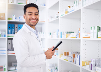 Naklejka na ściany i meble Man, portrait and pharmacist with tablet in pharmacy, drugstore or shop. Face, technology and Asian medical professional, happy doctor or worker with a pharmaceutical job for healthcare in Cambodia