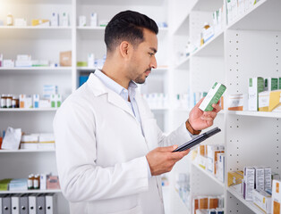 Man, pharmacist and tablet for pills, stock check and reading in pharmacy store. Technology,...