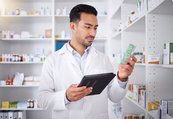 Man, pharmacist and tablet for medicine, stock check and reading in pharmacy store. Technology,...
