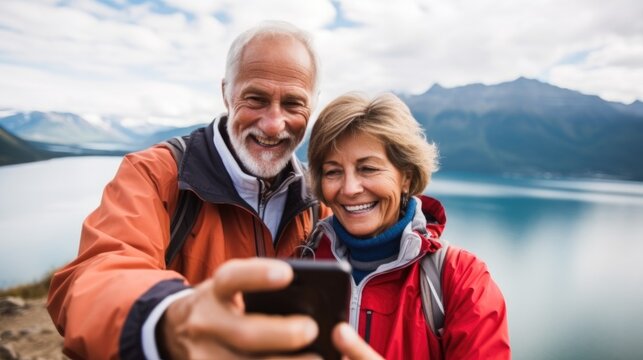 Happy Senior Travelers In New Zealand, Senior couple using smartphone taking selfies, Travel Vacation Retirement Lifestyle Concept.