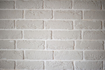 Decorative wall decoration with plaster bricks.